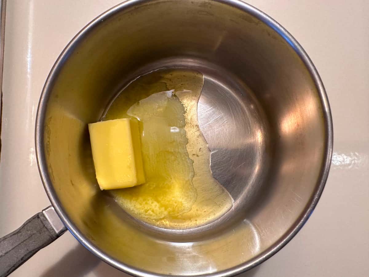 Butter melting in small saucepan.
