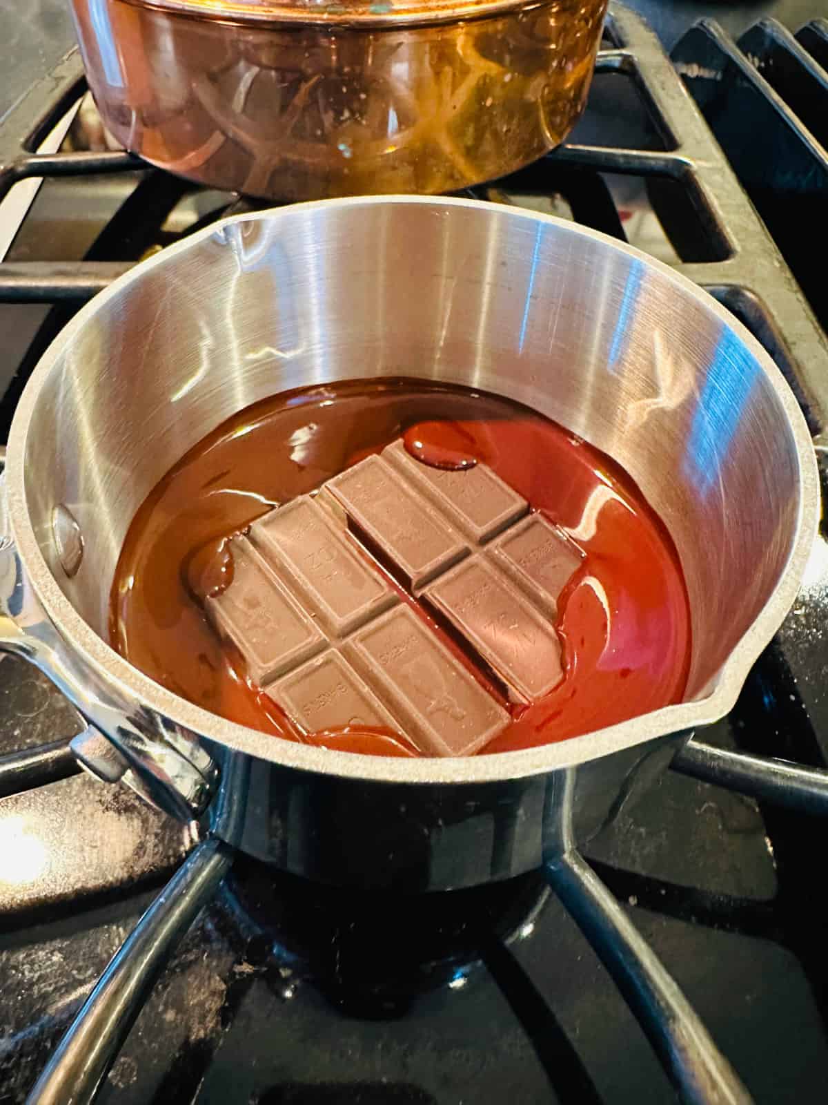 Chocolate melting in a steel saucepan