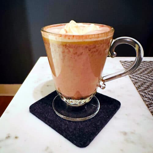 https://secretkitchensociety.com/wp-content/uploads/2023/02/Spanish-Hot-Chocolate-served-500x500.jpeg