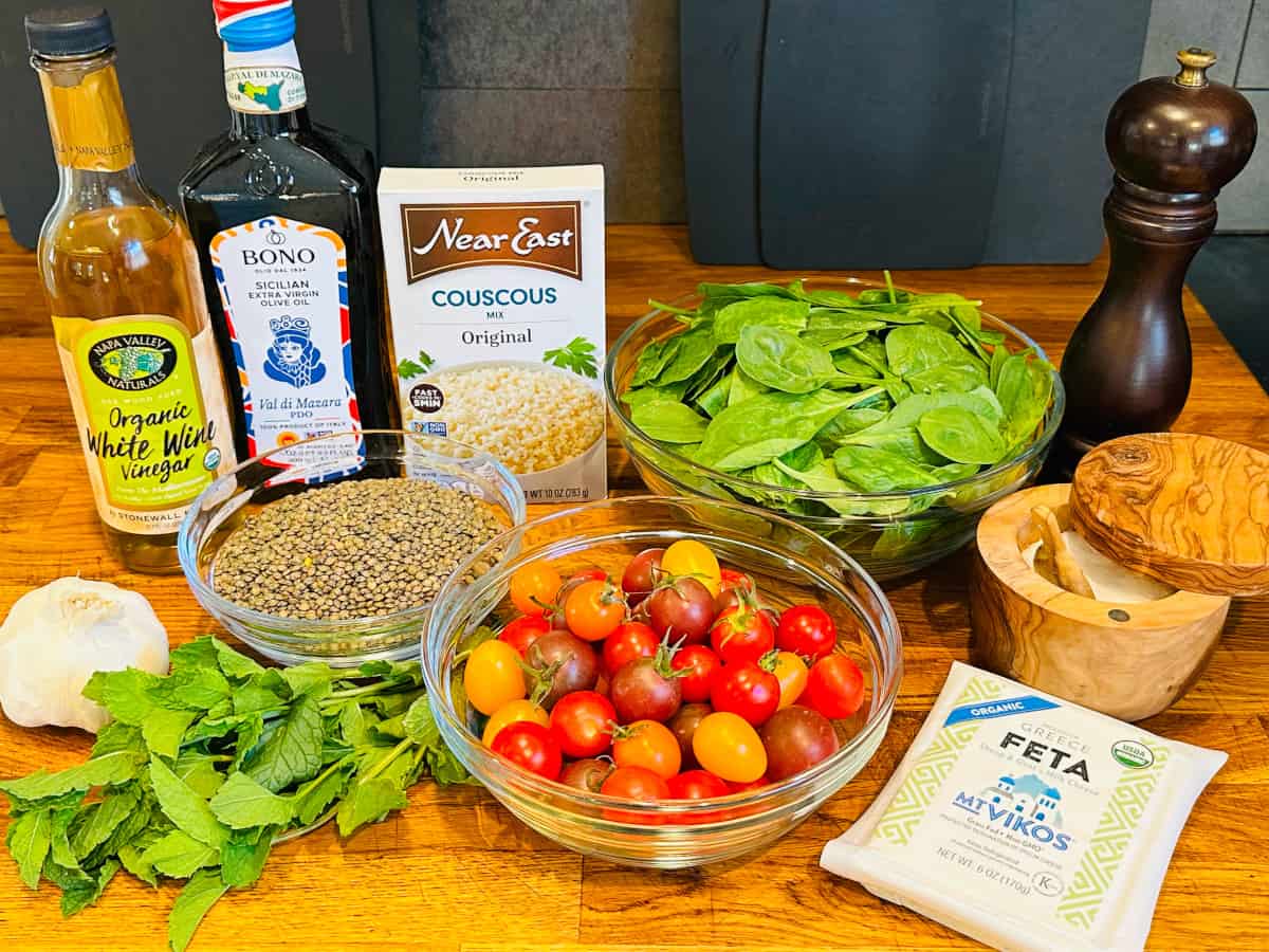 Ingredients for mediterranean couscous and lentil salad.