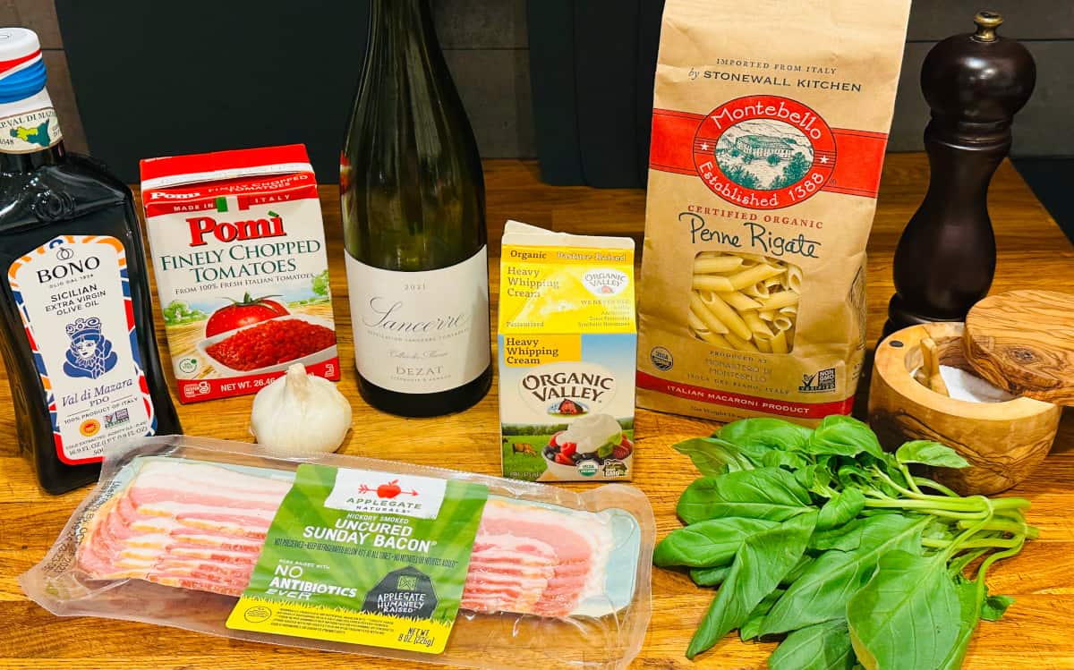 Ingredients for penne with tomato cream sauce.