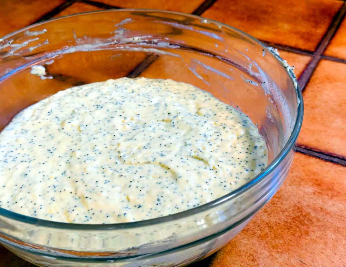 Finished waffle batter resting in a glass bowl.